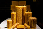 Drippy beeswax pillar candles and beeswax bars