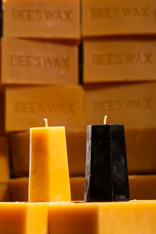 beeswax hexagon pillar candles in natural and black