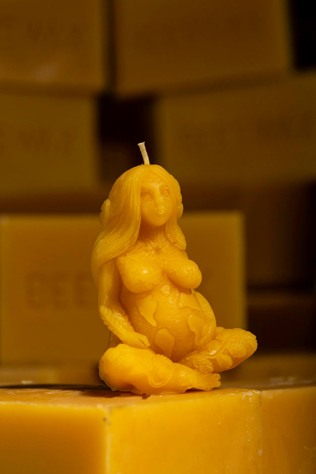 The Mother. Mother Earth shaped beeswax candle