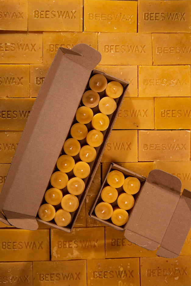 waxing-and-raining-beeswax-votive-candles-in-boxes