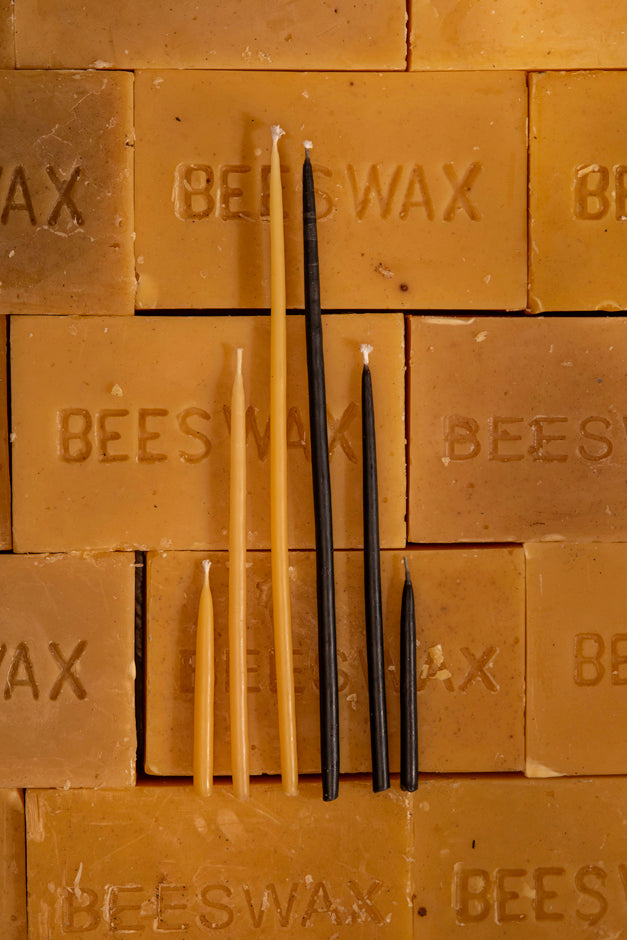 waxing and raining beeswax birthday candles with beeswax bars