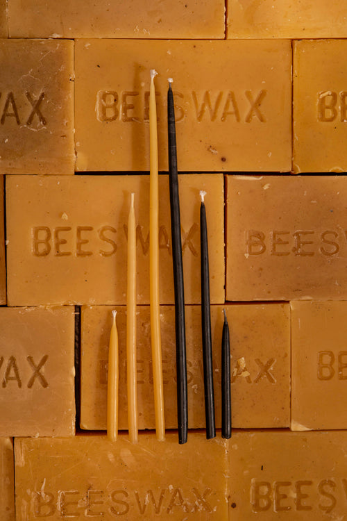 waxing and raining beeswax birthday candles with beeswax bars